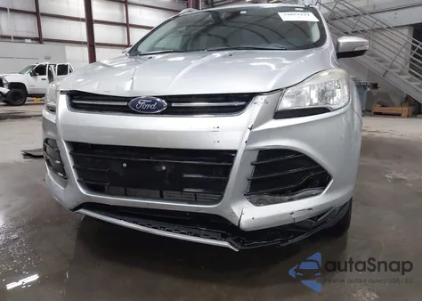 2014 Ford Escape Titanium z USA, uszkodzony, nr VIN 1FMCU9J98EUB63168